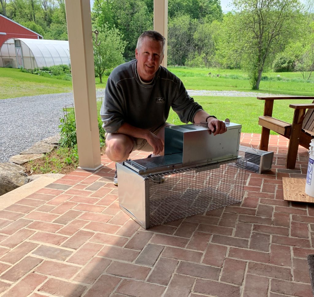 Duane on porch with Uhlik Repeater trap