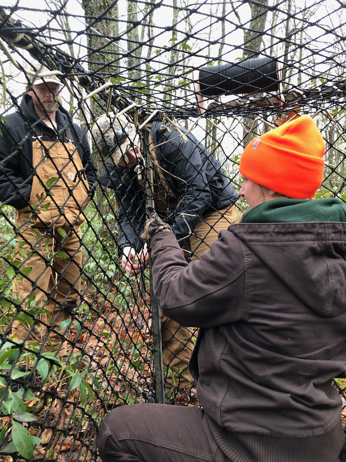 Crew repairing a Clover trap