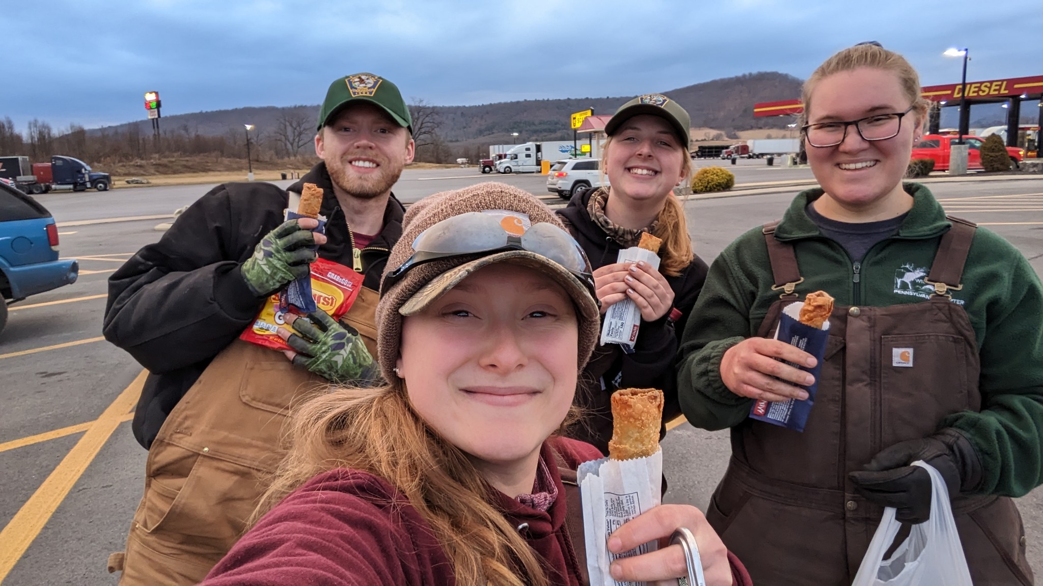 Selfie of crew with eggrolls